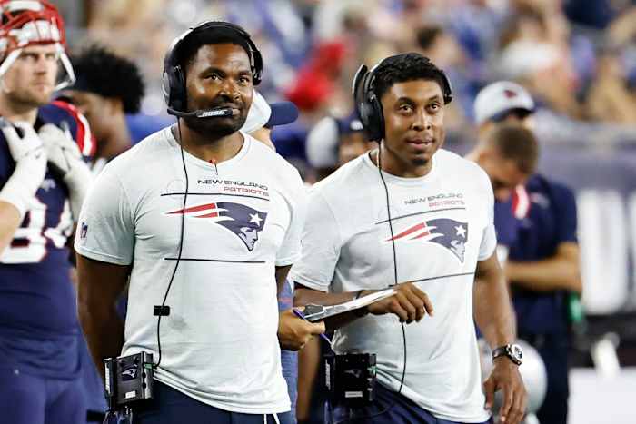 New England Patriots head coach Jerod Mayo (left), defensive coordinator DeMarcus Covington (right).